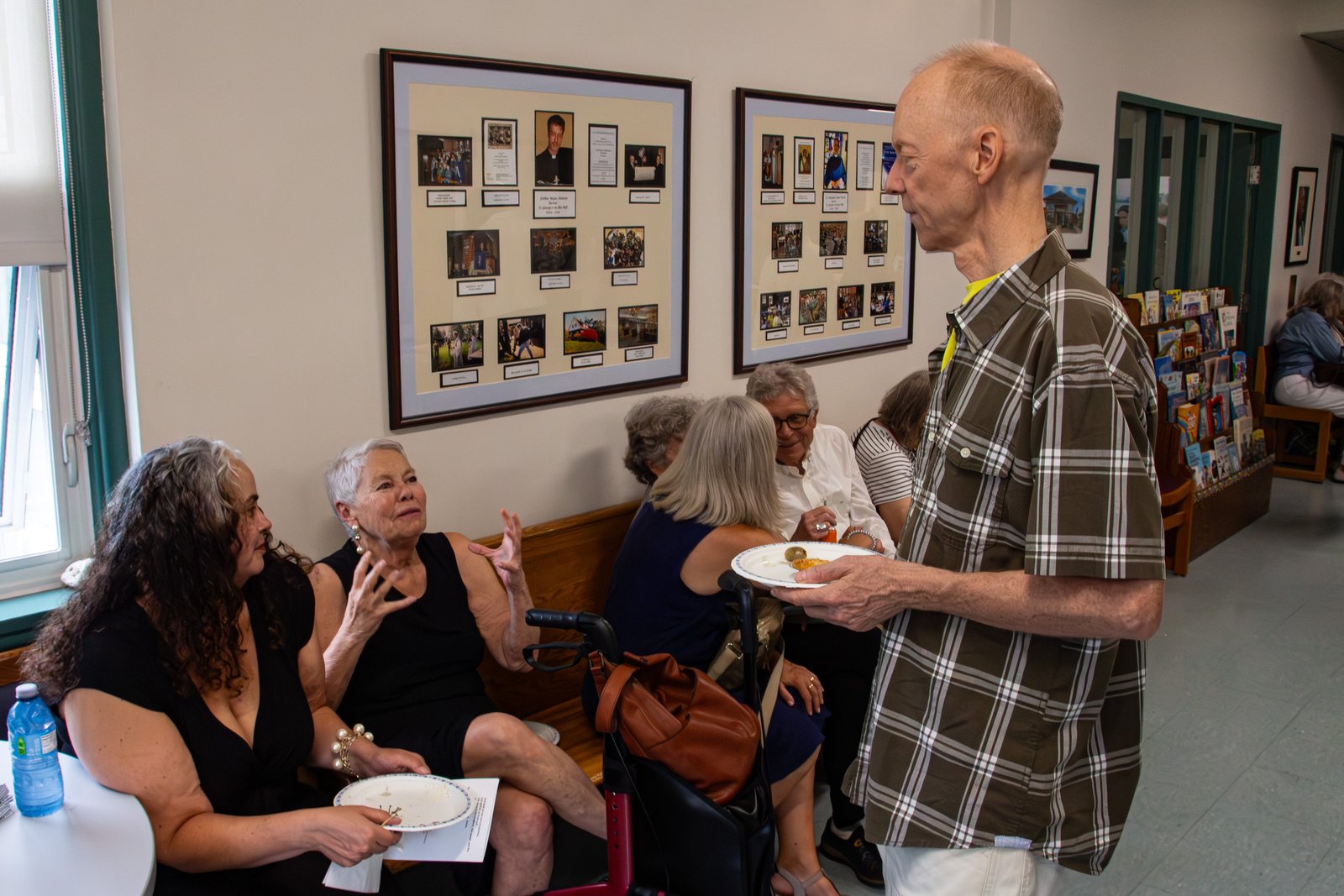 Guests sharing stories at the reception