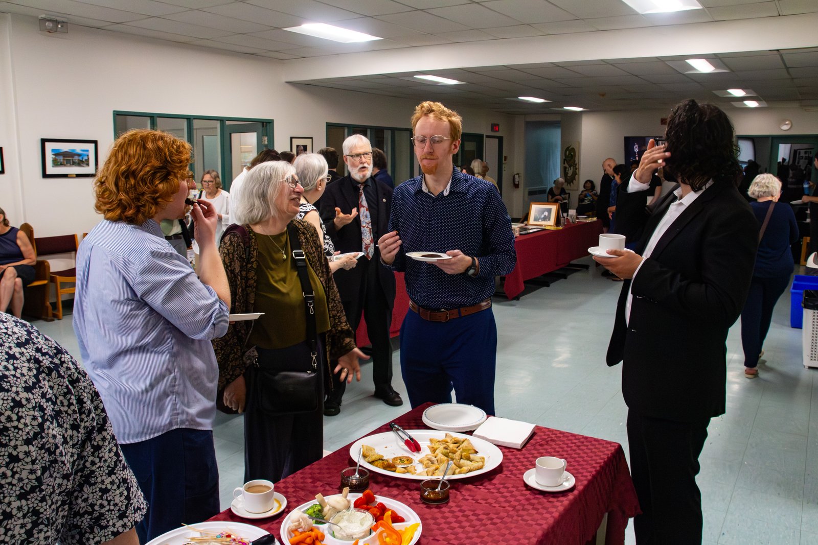 Friends gathered around the refreshments