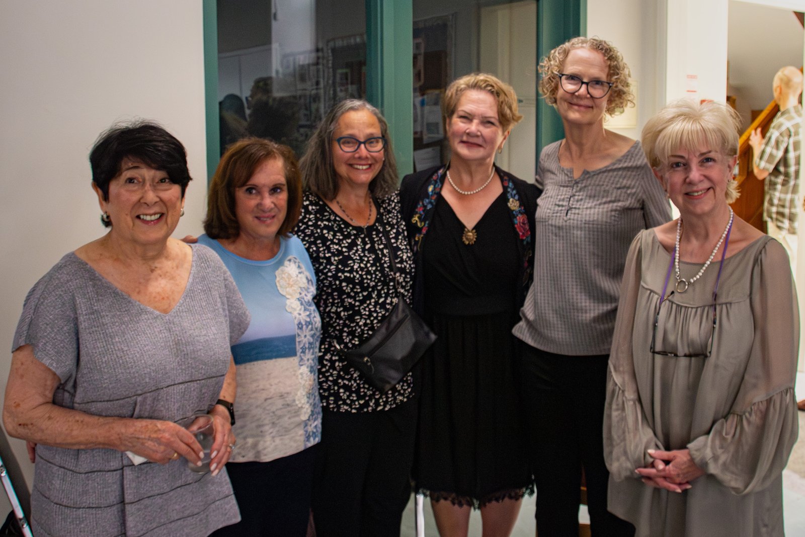 A group of friends together at the reception
